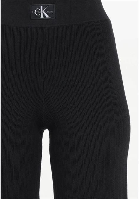 Women's black flared trousers in ribbed stretch cotton CALVIN KLEIN JEANS | J20J222599BEHBEH